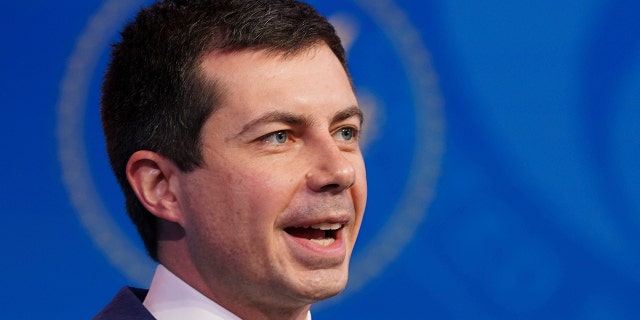 FILE - In this Dec. 16, 2020, file photo President-elect Joe Biden's nominee for Transportation Secretary former South Bend, Ind. Mayor Pete Buttigieg, President-elect speaks during a news conference at The Queen theater in Wilmington, Del. (Kevin Lamarque/Pool via AP, File)