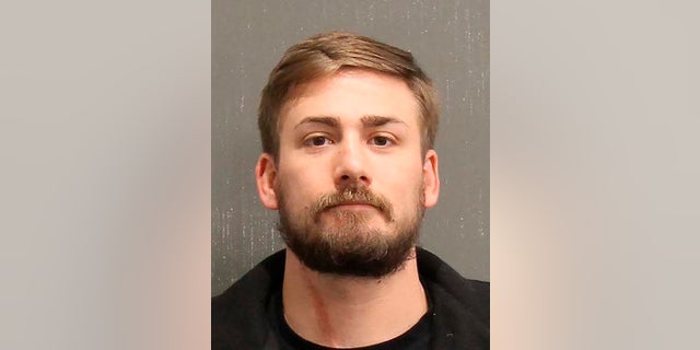 This photo provided by the Metro Government of Nashville and Davidson County, Tenn., shows Eric Gavelek Munchel. Munchel has been arrested in Tennessee in connection with the Jan. 6 riot at the U.S. Capitol in Washington. (Metro Government of Nashville and Davidson County, Tenn. via AP)