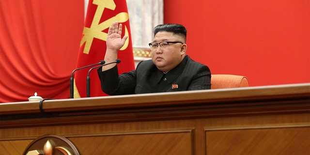 In this photo provided by the North Korean government, North Korean leader Kim Jong Un attends the ruling party congress in Pyongyang, North Korea, Sunday, Jan. 10, 2021. (Korean Central News Agency/Korea News Service via AP)