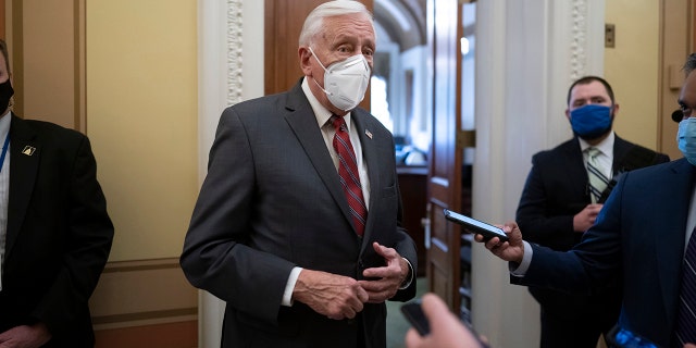 House Majority Leader Steny Hoyer, D-Md., talks to reporters just outside the House chamber after a resolution calling for the removal of President Donald Trump from office was blocked by Republicans at the Capitol in Washington Jan. 11, 2021. 