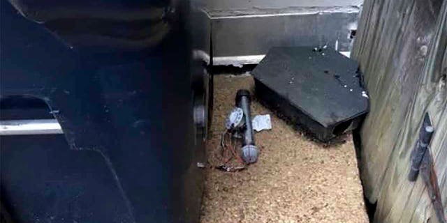 An explosive device is shown outside of the Republican National Committee office, Wednesday, Jan. 6, 2021 in Washington. (AP Photo)