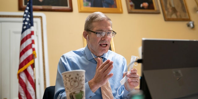 Rep. Jim Jordan, R-Ohio, testifies to the House Rules Committee as the panel considers a resolution calling on Vice President Mike Pence to activate the 25th Amendment to declare President Donald Trump incapable of executing the duties of his office, at the Capitol in Washington, Tuesday, Jan. 12, 2021. Jordan accused Rep. Jim McGovern, D-Mass., of hypocrisy for objecting to the electoral votes for President Trump from Alabama in 2017. (AP Photo/J. Scott Applewhite)