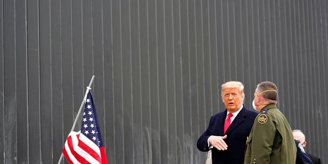 President Donald Trump tours a section of the U.S.-Mexico border wall under construction Tuesday, Jan. 12, 2021, in Alamo, Texas. (AP Photo/Alex Brandon)