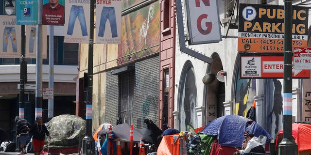 FILE: Tents line a sidewalk on Golden Gate Avenue in San Francisco.