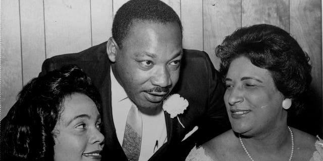 Martin Luther King, Jr. with his wife, Coretta, left, and civil rights champion Constance Baker Motley before the start of a Southern Christian Leadership Conference banquet in Birmingham, Ala., in 1965.