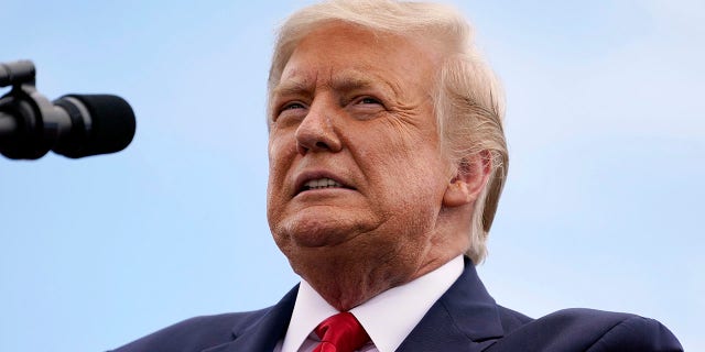 President Donald Trump speaks at the Jupiter Inlet Lighthouse and Museum in Jupiter, Fla. Trump is set to leave office Wednesday before the Senate begins an impeachment trail that could result in him being barred from holding office in the future. (AP Photo/Evan Vucci, File)