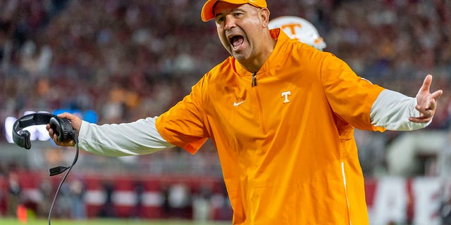 In this Oct. 19, 2019, file photo, Tennessee head coach Jeremy Pruitt yells at the officials during a game against Alabama in Tuscaloosa, Ala. Tennessee fired Pruitt Jan. 18, 2021.