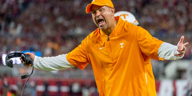 In this Oct. 19, 2019 file photo, Tennessee head coach Jeremy Pruitt yells at the officials during a game against Alabama in Tuscaloosa, Alabama.  Tennessee fired Pruitt on January 18, 2021.