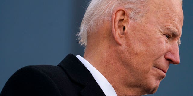 President-elect Joe Biden tears up as he speaks at the Major Joseph R. "Beau" Biden III National Guard/Reserve Center, Tuesday, Jan. 19, 2021, in New Castle, Del. (AP Photo/Evan Vucci)
