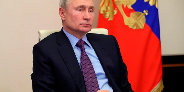 Russian President Vladimir Putin attends a meeting via video conference at the Novo-Ogaryovo residence outside Moscow, 俄国, 星期三, 一月. 20, 2021. (Mikhail Klimentyev, Sputnik, Kremlin Pool Photo via AP)