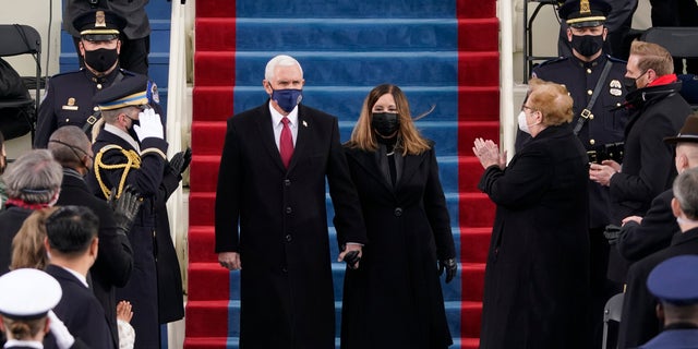 Vice President Mike Pence and his wife Karen arrive for the 59th Presidential Inauguration at the United States Capitol for President-elect Joe Biden in Washington, Wednesday, January 20, 2021 (AP Photo / Patrick Semansky, Pool)