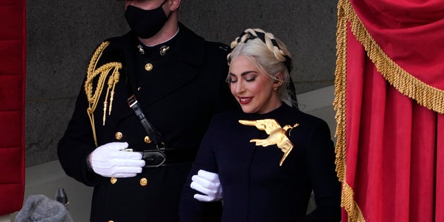 Lady Gaga arrives to perform the national anthem at the 59th Presidential Inauguration at the U.S. Capitol in Washington, Wednesday, January 20, 2021. 