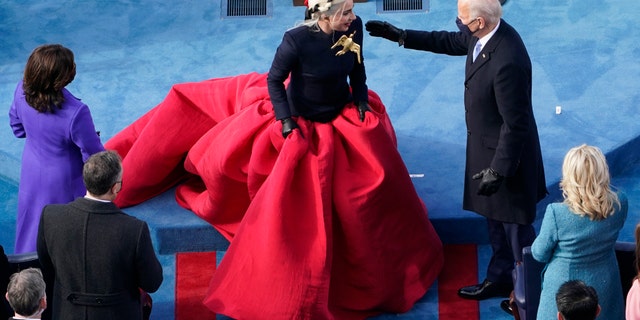 President Joe Biden greets Lady Gaga during the 59th Presidential Inauguration at the U.S. Capitol in Washington, Wednesday, Jan. 20, 2021.