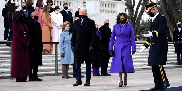 President Joe Biden and Vice President Kamala Harris arrive at the Tomb of the Unknown Soldier at Arlington National Cemetery during Inauguration Day ceremonies in Arlington, Va.  (AP Photo/Evan Vucci)