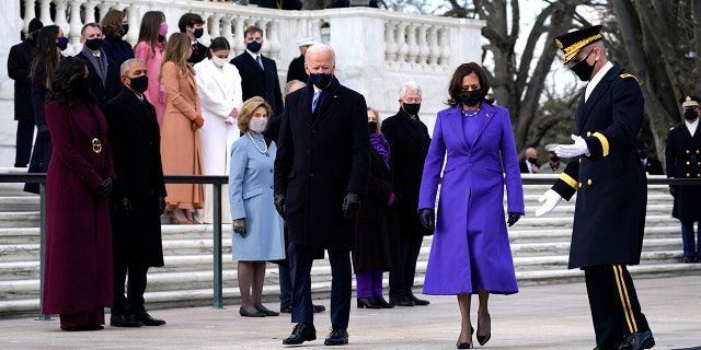 President Joe Biden and Vice President Kamala Harris arrive at the Tomb of the Unknown Soldier at Arlington National Cemetery during Inauguration Day ceremonies in Arlington, Va. (AP Photo/Evan Vucci)