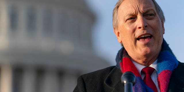 In this Dec. 3, 2020 file photo, Freedom Caucus Chairman Rep. Andy Biggs, R-Ariz., speaks on Capitol Hill in Washington. 