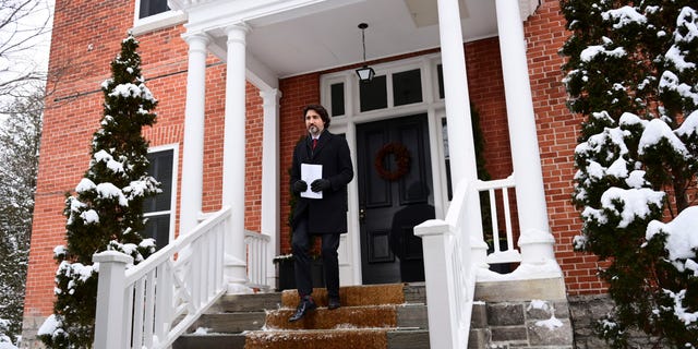 Prime Minister Justin Trudeau holds a press conference at Rideau Cottage in Ottawa on Friday, Jan. 22, 2021. During the press conference, Trudeau said his government is prepared to impose even stricter regulations on travel than the country already has in place.<br> (Sean Kilpatrick/The Canadian Press via AP)