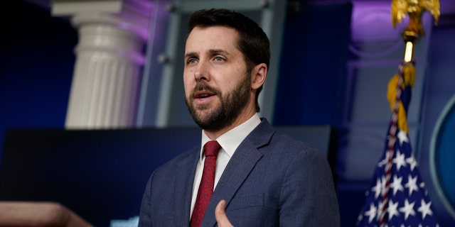 National Economic Council Director Brian Deese speaks during a press briefing at the White House, Friday, Jan. 22, 2021, in Washington. (AP Photo/Evan Vucci)