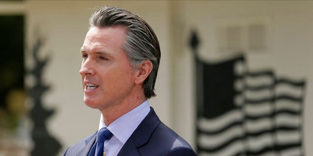 In this Friday, May 22, 2020, file photo, California Governor Gavin Newsom speaks at a press conference at the Veterans Home of California in Yountville, California, California on Monday lifted its regional stay order at the house that had been in place since December.  (AP Photo / Eric Risberg, swimming pool, file)