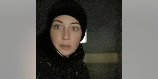 In this photo released by Yulia Navalny, wife of Russian opposition leader Alexei Navalny, in her Instagram account yulia_navalnaya, Yulia Navalnaya poses for a selfie inside a police bus after she was detained during a protest against the jailing of her husband in Moscow, Russia, Saturday, Jan. 23, 2021. (Yulia Navalny via AP)