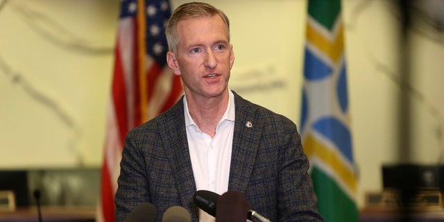 In this Aug. 30, 2020 file photo Portland Mayor Ted Wheeler speaks during a news conference. On Monday, it was revealed that he pepper-sprayed a man who confronted him outside a pub over the weekend for not wearing a mask while dining. (Sean Meagher/The Oregonian via AP, file)