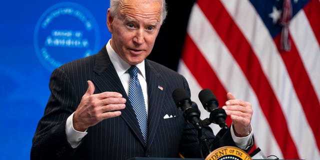 President Joe Biden answers questions from reporters in the South Court Auditorium on the White House complex, Monday, Jan. 25, 2021, in Washington. (AP Photo/Evan Vucci)