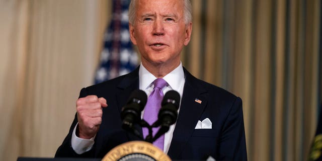 President Joe Biden delivers remarks on racial equity, in the State Dining Room of the White House, Tuesday, Jan. 26, 2021, in Washington. (AP Photo/Evan Vucci)