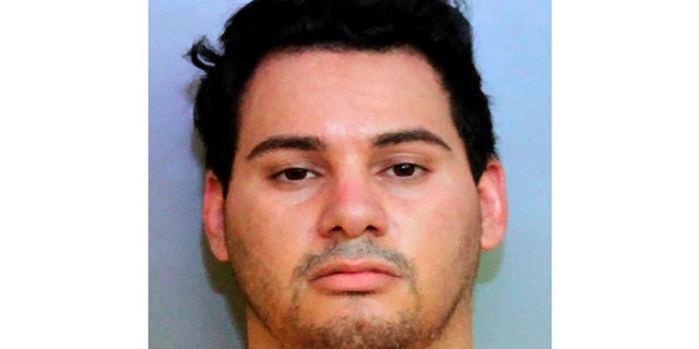 This undated photo provided by the Polk County Sheriff's Office, in Florida, shows Joshua Colon.  (Polk County Sheriff's Office via AP)