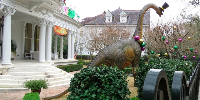 Because pandemic dangers from large and widespread crowds have canceled Mardi Gras parades in New Orleans this year, thousands of people are decorating their homes as floats. (AP Photo/Janet McConnaughey)