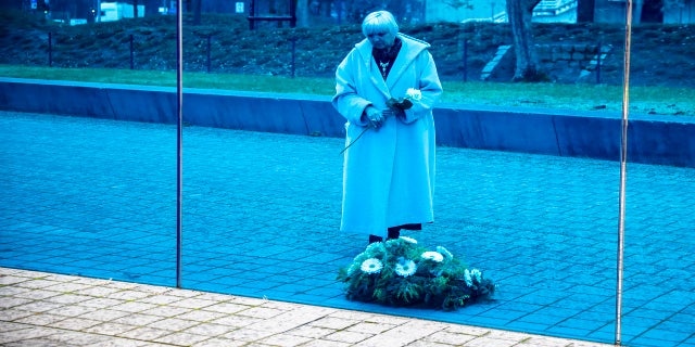 German Parliament Vice President Claudia Roth commemorates at the Memorial for the Victims of Nazi Euthanasia Killings on the International Holocaust Remembrance Day, in Berlin, Germany, Wednesday, Jan. 27, 2021. (AP Photo/Markus Schreiber)
