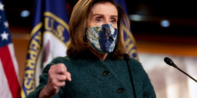 House Speaker Nancy Pelosi of Calif. speaks at a news conference on Capitol Hill in Washington, Thursday, Jan. 28, 2021. (AP Photo/Andrew Harnik)