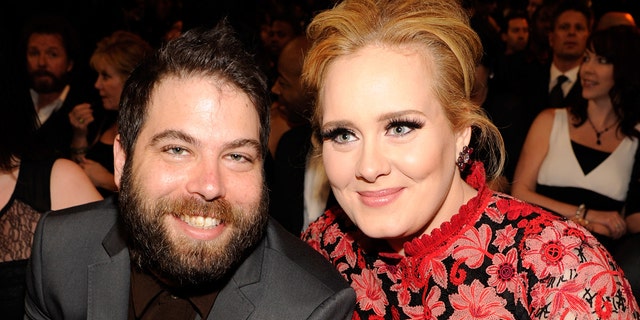 Adele (R) and Simon Konecki attend the 55th Annual Grammy Awards at STAPLES Center on February 10, 2013, in Los Angeles, California.