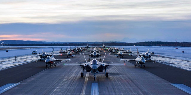 Aircraft assigned to the 354th Fighter Wing and 168th Wing park in formation on Eielson Air Force Base, Alaska, Dec. 18, 2020. 