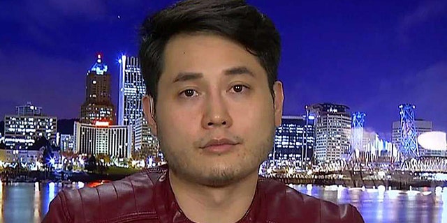 Conservative author Andy Ngo said Friday that a man who allegedly attacked him and took his cellphone at a gym has been charged. 