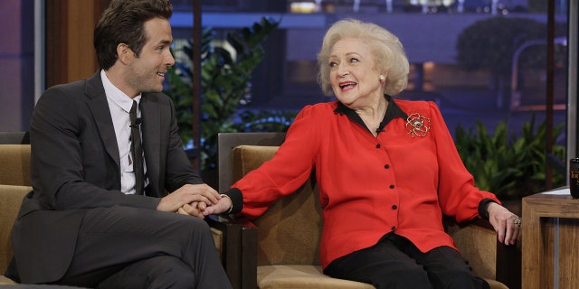 In his video caption, Reynolds (left) called 'The Proposal' co-star Betty White (right) 'the funniest person on the planet'.  Photo by: Paul Drinkwater / NBC / NBCU Photo Bank