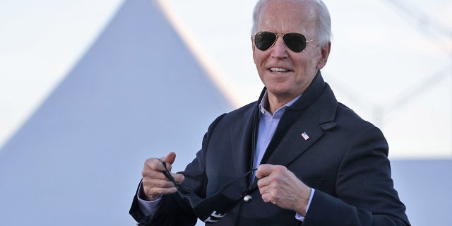President-elect Joe Biden speaks during a campaign rally with Democratic candidates for the U.S. Senate Jon Ossoff and Rev. Raphael Warnock the day before their runoff election in the parking lot of Centerparc Stadium January 04, 2021 in Atlanta, Georgia. Biden will be sworn in as the United States' 46th president at noon on Tuesday. (Photo by Chip Somodevilla/Getty Images)