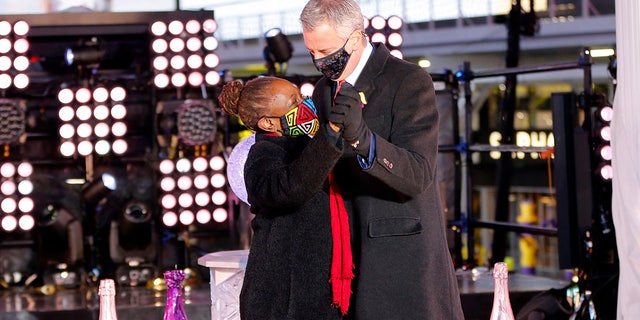 Mayor of New York City Bill de Blasio and Chirlane McCray dance onstage in Times Square during last night's New Year’s Eve celebration in New York City. (Gary Hershorn-Pool/Getty Images)