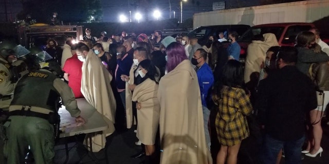 California authorities busted two underground "superspreader" events and arrested 182 people.