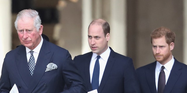 Prince Harry (right) stepped back as a senior royal. His father, Prince Charles (left), and brother, Prince William (center), will both serve as king in the future. (Photo by Chris Jackson/Getty Images)