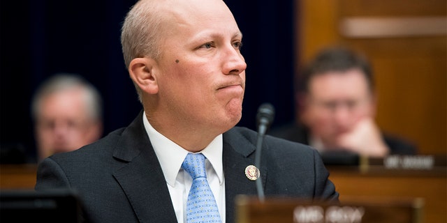 UNITED STATES - APRIL 2: Rep. Chip Roy, R-Texas, left, listens during House Oversight and Reform Committee markup to resolution authorizing issuance of security clearances and census summons of 2020 on Tuesday April 2, 2019 (Photo By Bill Clark / CQ Roll Call)