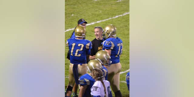 Joe Kennedy coached high school football in Bremerton, Washington.