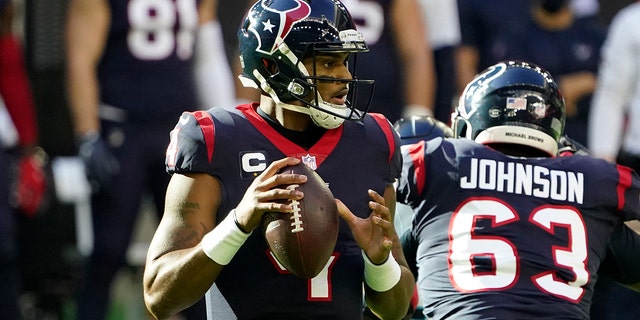 Houston Texans quarterback Deshaun Watson (4) looks to throw a pass against the Tennessee Titans during the first half of an NFL football game Sunday, Jan. 3, 2021, in Houston. (AP Photo/Sam Craft)