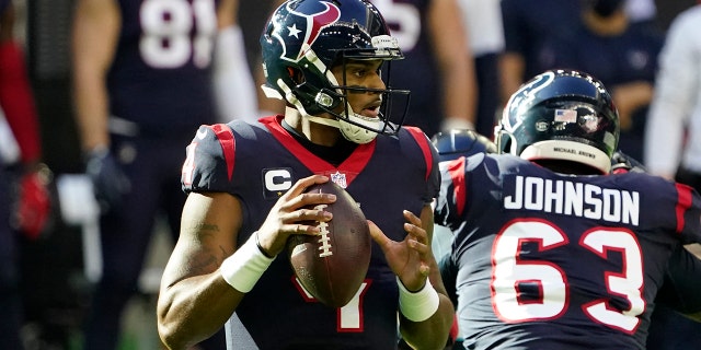 Houston Texans quarterback Deshaun Watson (4) looks to throw a pass against the Tennessee Titans during the first half of an NFL football game Sunday, Jan. 3, 2021, in Houston. (AP Photo/Sam Craft)