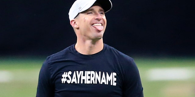 New Orleans Saints quarterback Drew Brees makes a face while warming up before an NFL wild-card playoff football game against the Chicago Bears in New Orleans, Sunday, Jan. 10, 2021. (AP Photo/Brett Duke)