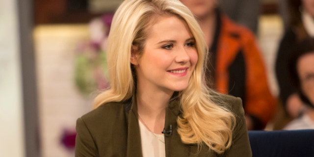 Elizabeth Smart said she has slowly started to open up to her oldest child about her ordeal.