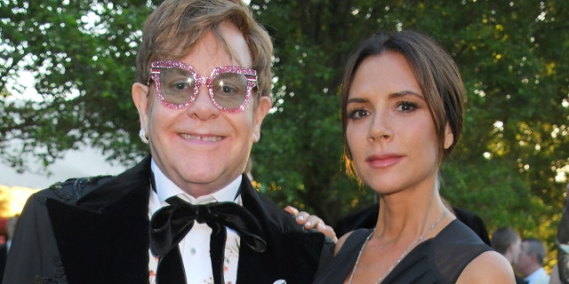 Victoria Beckham (right) said that watching Elton John (left) perform 'Tiny Dancer' helped her realize she wanted to leave the music industry. (Photo by David M. Benett/Dave Benett/Getty Images for BVLGARI and EJAF)