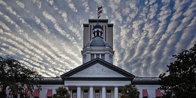 The Florida state Capitol in Tallahassee with a sunset.