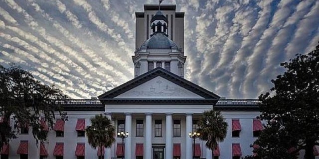 The Florida state Capitol in Tallahassee with a sunset.