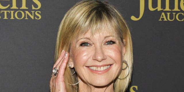 Olivia Newton-John reflected on how she ‘freaked out’ of the lyrics in her hit song ‘Physical’ after she recorded it. 