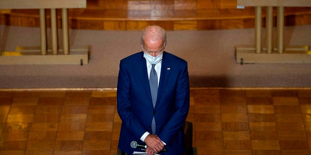 TOPSHOT - Democratic presidential candidate and former US Vice President Joe Biden prays at Grace Lutheran Church in Kenosha, Wisconsin, on September 3, 2020, following the police shooting of Jacob Blake.  (Photo by Jim Watson/AFP) (Photo by Jim Watson/AFP via Getty Images)